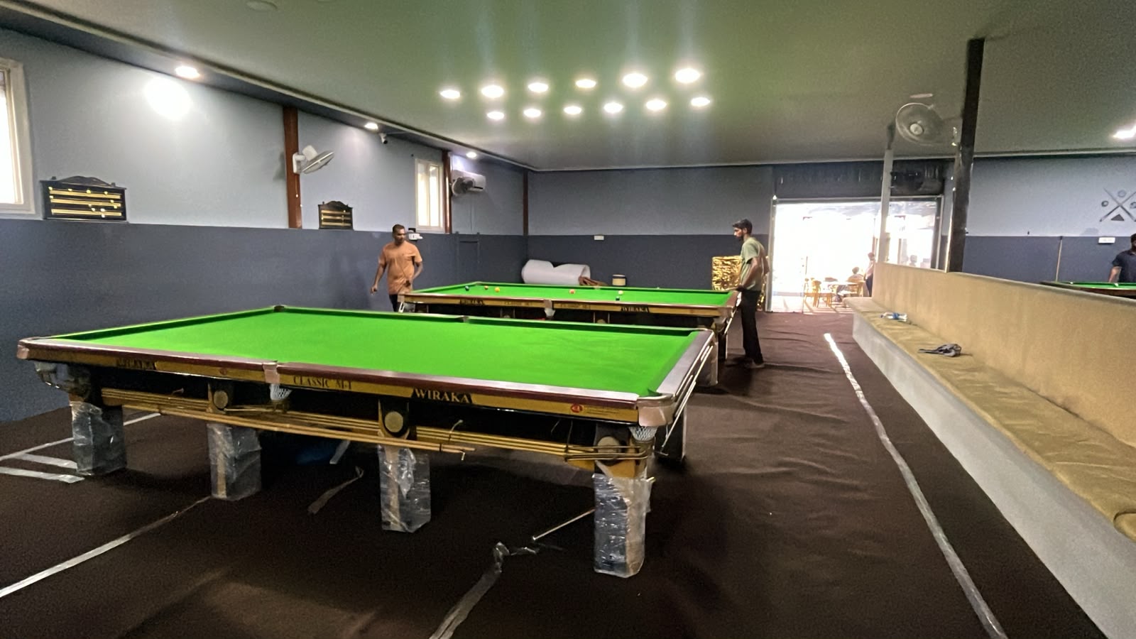 Players at the snooker tables