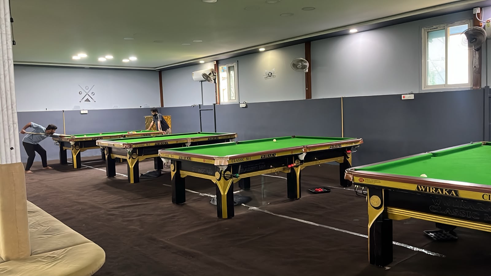 Full lounge interior showing all tables